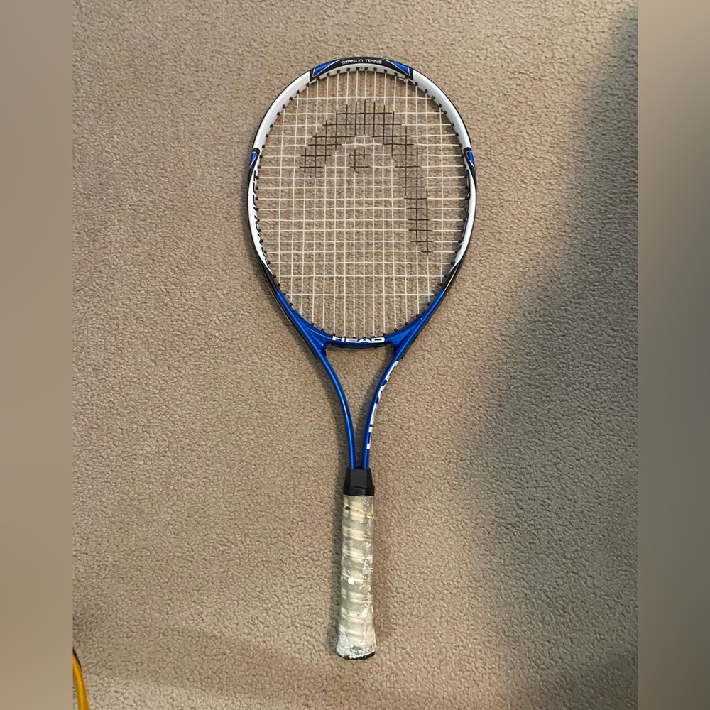 Head Blue and White Tennis Racket with Black Logo